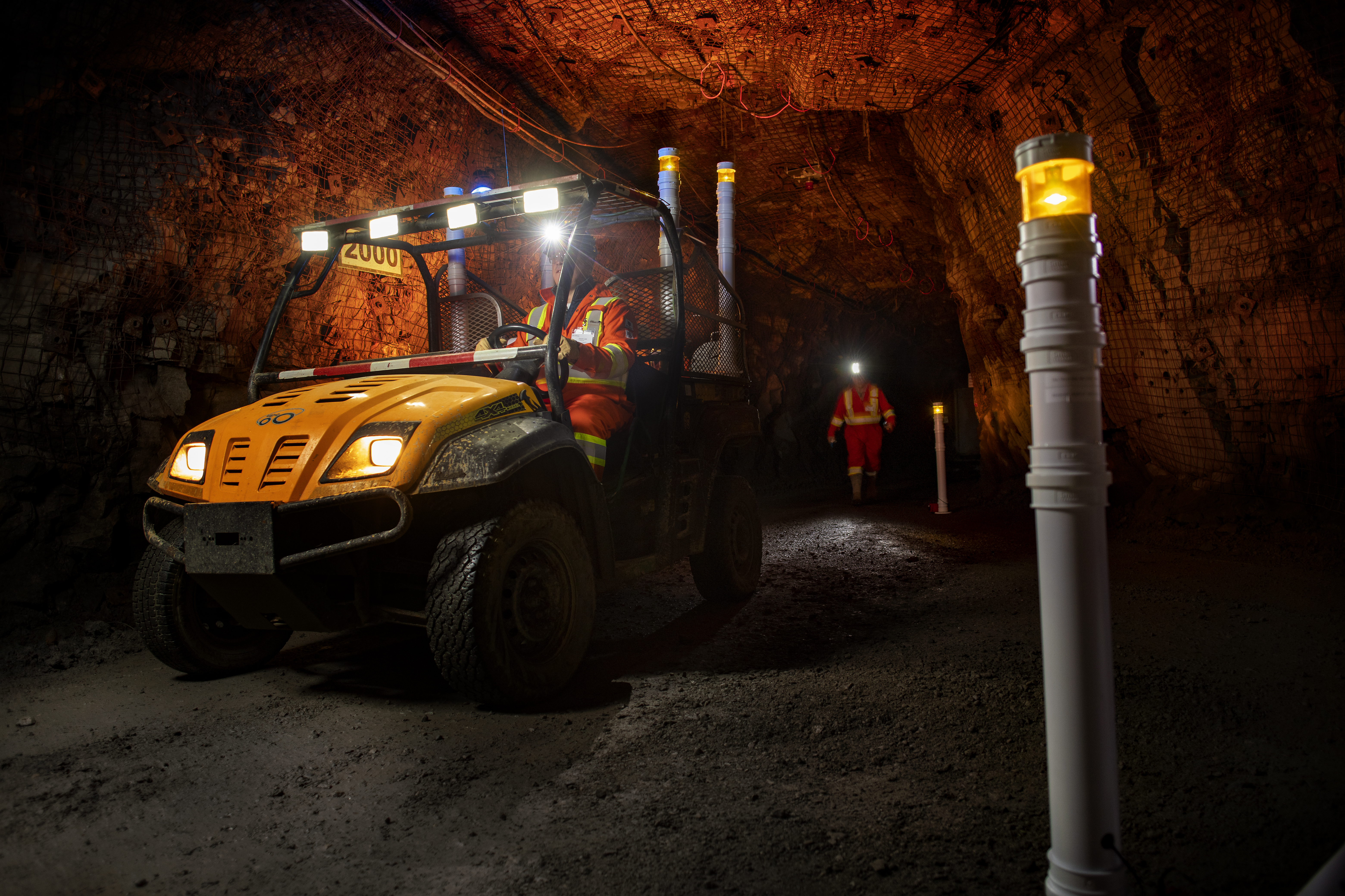 SmartTorch illuminated beacon deployed in an underground mine tunnel